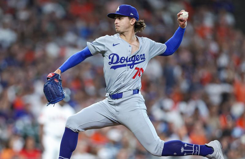 Jul 27, 2024; Houston, Texas, USA; Los Angeles Dodgers starting pitcher Justin Wrobleski (70) delivers a pitch during the first inning against the Houston Astros at Minute Maid Park. Mandatory Credit: Troy Taormina-USA TODAY Sports