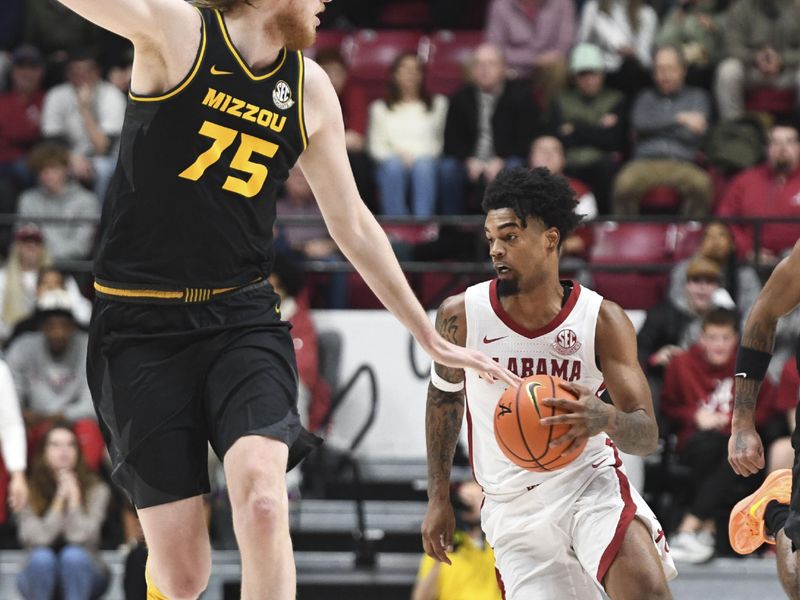 Jan 16, 2024; Tuscaloosa, Alabama, USA; Alabama guard Aaron Estrada brings the ball down the court while defended by Missouri center Connor Vanover (75) at Coleman Coliseum. Mandatory Credit: Gary Cosby Jr.-USA TODAY Sports