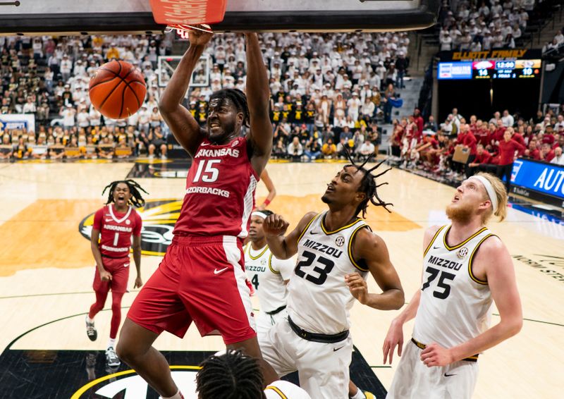 Jan 31, 2024; Columbia, Missouri, USA; Arkansas Razorbacks forward Makhi Mitchell (15) dunks the ball against the Missouri Tigers during the first half at Mizzou Arena. Mandatory Credit: Jay Biggerstaff-USA TODAY Sports