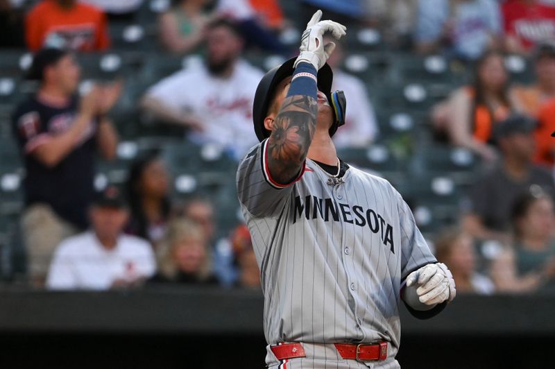 Apr 15, 2024; Baltimore, Maryland, USA; Minnesota Twins third baseman Jose Miranda   reacts at home plate after hitting a solo home run in the second inning against the Baltimore Orioles  at Oriole Park at Camden Yards. Mandatory Credit: Tommy Gilligan-USA TODAY Sports