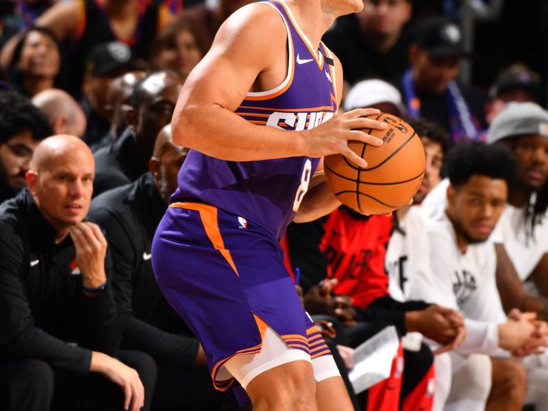 PHOENIX, AZ - NOVEMBER 2: Grayson Allen #8 of the Phoenix Suns looks to pass the ball during the game against the Portland Trail Blazers on November 2, 2024 at Footprint Center in Phoenix, Arizona. NOTE TO USER: User expressly acknowledges and agrees that, by downloading and or using this photograph, user is consenting to the terms and conditions of the Getty Images License Agreement. Mandatory Copyright Notice: Copyright 2024 NBAE (Photo by Barry Gossage/NBAE via Getty Images)