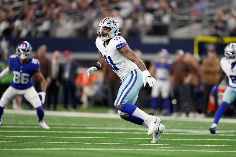 Dallas Cowboys linebacker Micah Parsons (11) rushes against the New York Giants during an NFL football game in Arlington, Texas, Saturday, Nov. 12, 2023. (AP Photo/Tony Gutierrez)