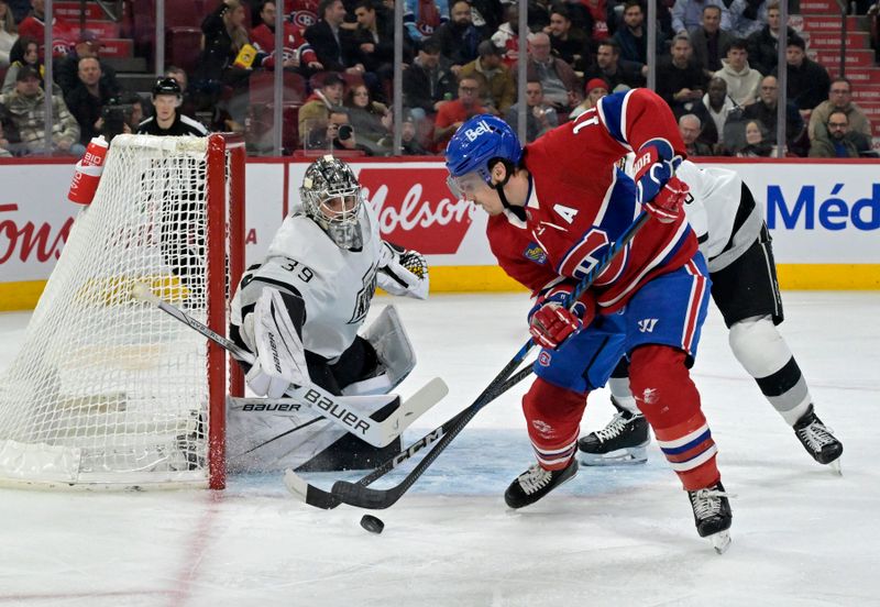 Dec 7, 2023; Montreal, Quebec, CAN; Los Angeles Kings goalie Cam Talbot (39) stops a shot by Montreal Canadiens forward Brendan Gallagher (11) during the second period at the Bell Centre. Mandatory Credit: Eric Bolte-USA TODAY Sports