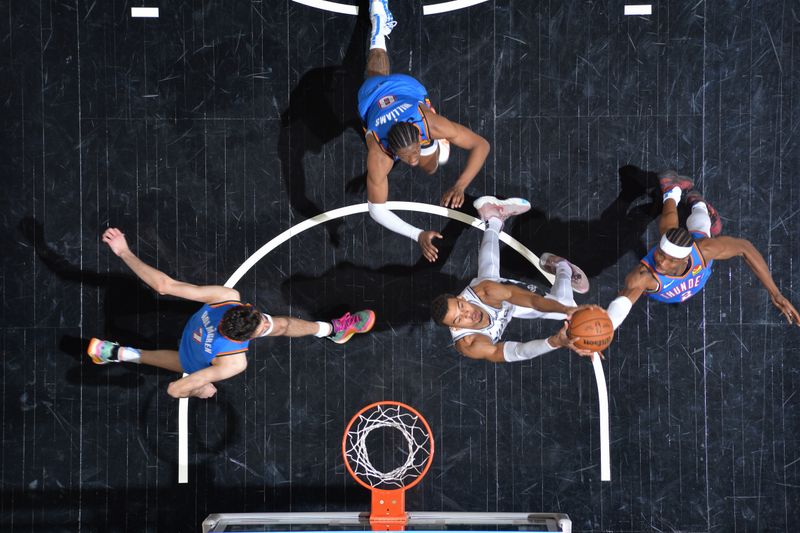 SAN ANTONIO, TX - FEBRUARY 29: Victor Wembanyama #1 of the San Antonio Spurs grabs a rebound during the game against the Oklahoma City Thunder on February 29, 2024 at the Frost Bank Center in San Antonio, Texas. NOTE TO USER: User expressly acknowledges and agrees that, by downloading and or using this photograph, user is consenting to the terms and conditions of the Getty Images License Agreement. Mandatory Copyright Notice: Copyright 2024 NBAE (Photos by Michael Gonzales/NBAE via Getty Images)