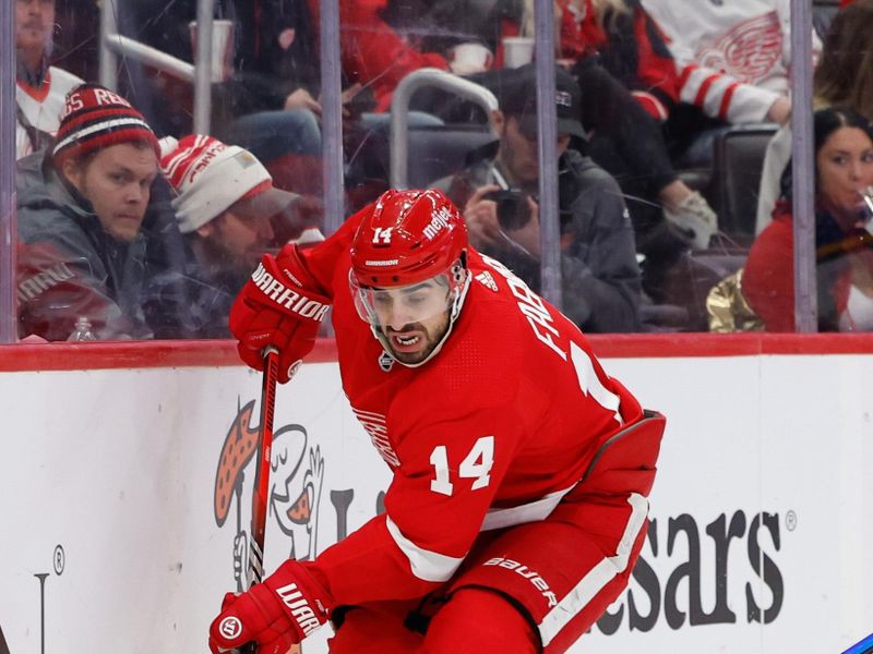 Feb 24, 2024; Detroit, Michigan, USA;  Detroit Red Wings center Robby Fabbri (14) skates with the puck in the second period against the St. Louis Blues at Little Caesars Arena. Mandatory Credit: Rick Osentoski-USA TODAY Sports