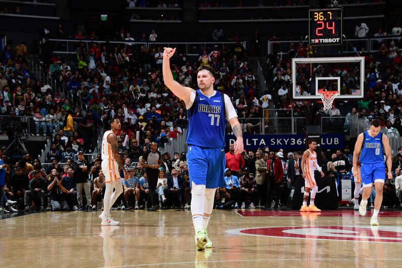 ATLANTA, GA - JANUARY 26: Luka Doncic #77 of the Dallas Mavericks reacts during the game against the Atlanta Hawks on January 26, 2024 at State Farm Arena in Atlanta, Georgia.  NOTE TO USER: User expressly acknowledges and agrees that, by downloading and/or using this Photograph, user is consenting to the terms and conditions of the Getty Images License Agreement. Mandatory Copyright Notice: Copyright 2024 NBAE (Photo by Scott Cunningham/NBAE via Getty Images)
