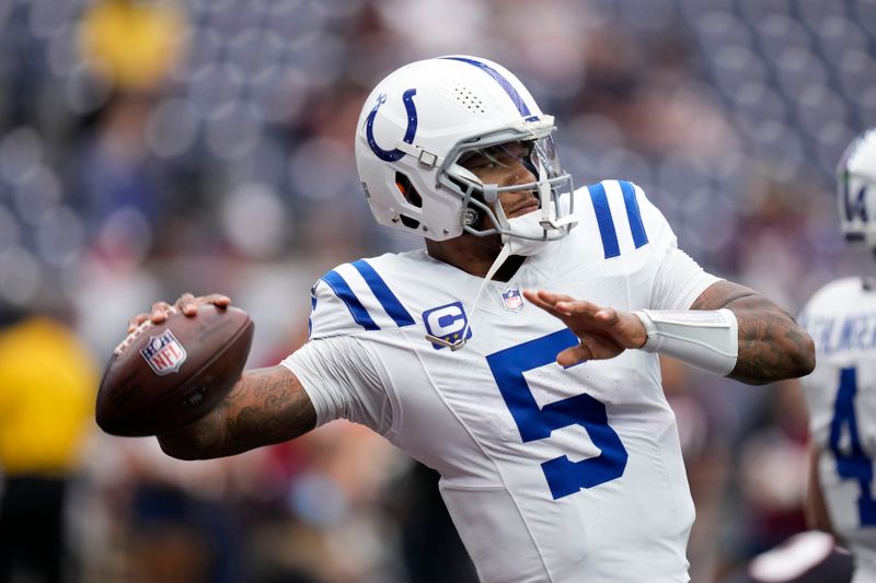 Indianapolis Colts quarterback Anthony Richardson warms up before an NFL football game against the Houston Texans, Sunday, Oct. 27, 2024, in Houston. (AP Photo/Eric Christian Smith)