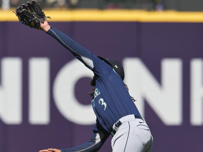 Apr 9, 2023; Cleveland, Ohio, USA; Seattle Mariners shortstop J.P. Crawford (3) can not make the catch of a ball hit by Cleveland Guardians third baseman Jose Ramirez (not pictured) during the sixth inning at Progressive Field. Mandatory Credit: Ken Blaze-USA TODAY Sports