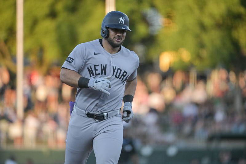 May 9, 2025; West Sacramento, California, USA; New York Yankees outfielder Jasson Dominguez (24) rounds the bases after hitting a home run against the Athletics during the third inning at Sutter Health Park. Mandatory Credit: Ed Szczepanski-Imagn Images