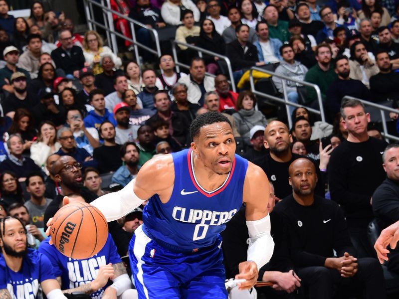 LOS ANGELES, CA - FEBRUARY 12:  Russell Westbrook #0 of the LA Clippers goes to the basket during the game on February 12, 2024 at Crypto.Com Arena in Los Angeles, California. NOTE TO USER: User expressly acknowledges and agrees that, by downloading and/or using this Photograph, user is consenting to the terms and conditions of the Getty Images License Agreement. Mandatory Copyright Notice: Copyright 2024 NBAE (Photo by Adam Pantozzi/NBAE via Getty Images)