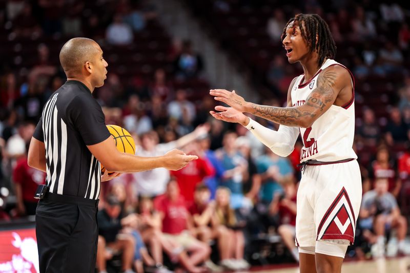 Mar 4, 2023; Columbia, South Carolina, USA; South Carolina Gamecocks guard Zachary Davis (12) disputes a call in the second half against the Georgia Bulldogs at Colonial Life Arena. Mandatory Credit: Jeff Blake-USA TODAY Sports