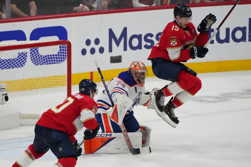 Jun 24, 2024; Sunrise, Florida, USA; Florida Panthers forward Anton Lundell (15) screens Edmonton Oilers goaltender Skinner Stuart (74) during the first period in game seven of the 2024 Stanley Cup Final at Amerant Bank Arena. Mandatory Credit: Jim Rassol-USA TODAY Sports