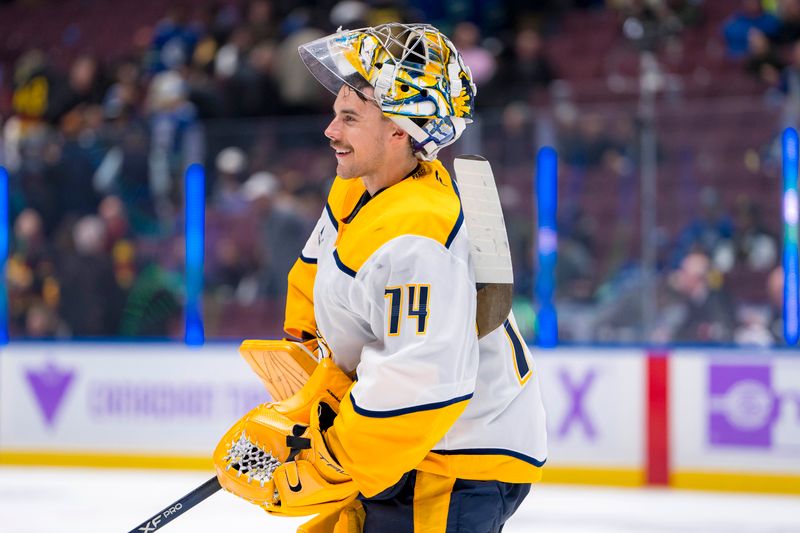 Nov 17, 2024; Vancouver, British Columbia, CAN; Nashville Predators goalie Juuse Saros (74) celebrates the victory against the Vancouver Canucks at Rogers Arena. Mandatory Credit: Bob Frid-Imagn Images