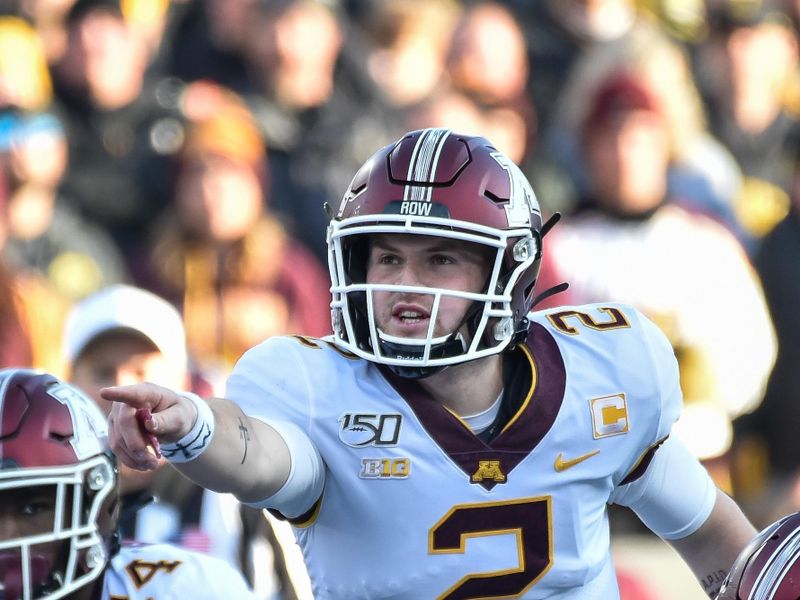 Nov 16, 2019; Iowa City, IA, USA; Minnesota Golden Gophers quarterback Tanner Morgan (2) directs the offense against the Iowa Hawkeyes during the first quarter at Kinnick Stadium. Mandatory Credit: Jeffrey Becker-USA TODAY Sports