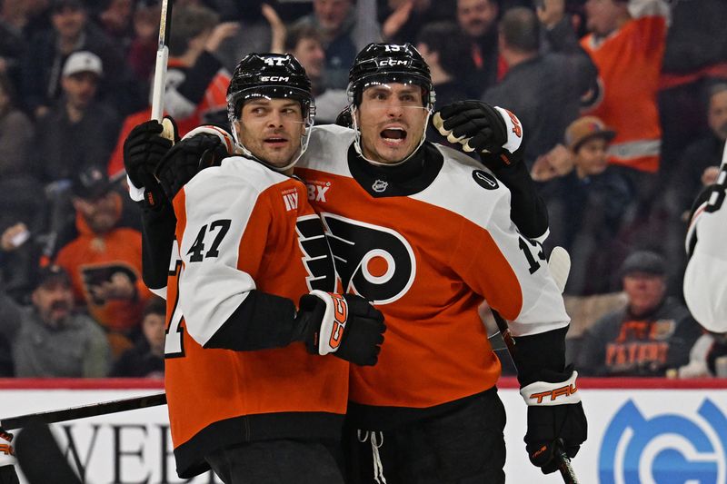 Jan 10, 2026; Philadelphia, Pennsylvania, USA; Philadelphia Flyers right wing Garnet Hathaway (19) celebrates his goal with defenseman Noah Juulsen (47) against the Tampa Bay Lightning during the first period at Xfinity Mobile Arena. Mandatory Credit: Eric Hartline-Imagn Images