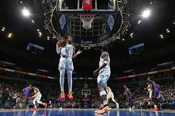 MINNEAPOLIS, MN -  DECEMBER 30: Troy Brown Jr. #23 of the Minnesota Timberwolves rebounds during the game against the Los Angeles Lakers on December 30, 2023 at Target Center in Minneapolis, Minnesota. NOTE TO USER: User expressly acknowledges and agrees that, by downloading and or using this Photograph, user is consenting to the terms and conditions of the Getty Images License Agreement. Mandatory Copyright Notice: Copyright 2023 NBAE (Photo by David Sherman/NBAE via Getty Images)