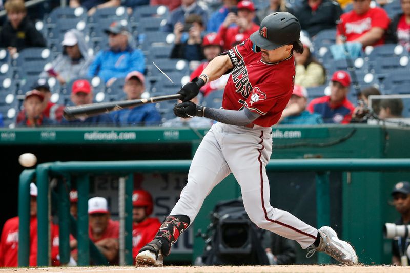 Jun 22, 2023; Washington, District of Columbia, USA; Washington Nationals second baseman Luis Garcia (2) hits a single against Washington Nationals starting pitcher Jake Irvin (not pictured) during the first inning at Nationals Park. Mandatory Credit: Amber Searls-USA TODAY Sports