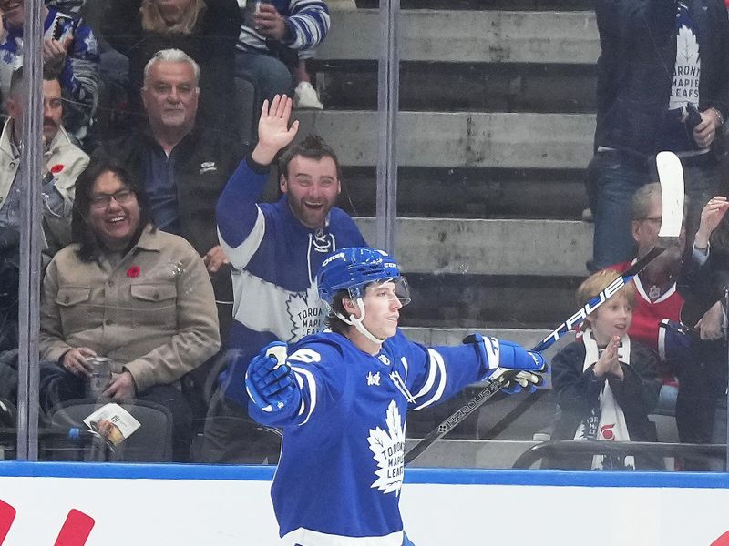 Nov 9, 2024; Toronto, Ontario, CAN; Toronto Maple Leafs right wing Mitch Marner (16) scores a goal Montreal Canadiens  and celebrates during the second period at Scotiabank Arena. Mandatory Credit: Nick Turchiaro-Imagn Images