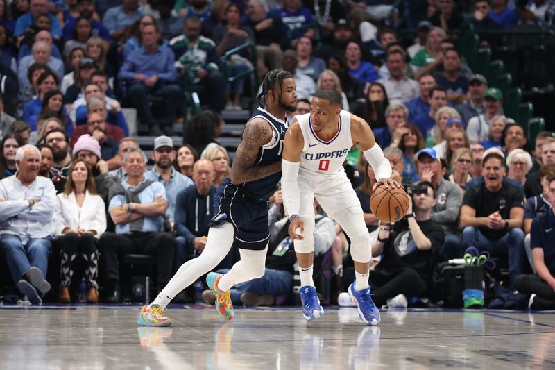 DALLAS, TX - APRIL 28: Russell Westbrook #0 of the LA Clippers dribbles the ball during the game against the Dallas Mavericks  during Round 1 Game 4 of the 2024 NBA Playoffs on April 28, 2024 at the American Airlines Center in Dallas, Texas. NOTE TO USER: User expressly acknowledges and agrees that, by downloading and or using this photograph, User is consenting to the terms and conditions of the Getty Images License Agreement. Mandatory Copyright Notice: Copyright 2024 NBAE (Photo by Tim Heitman/NBAE via Getty Images)