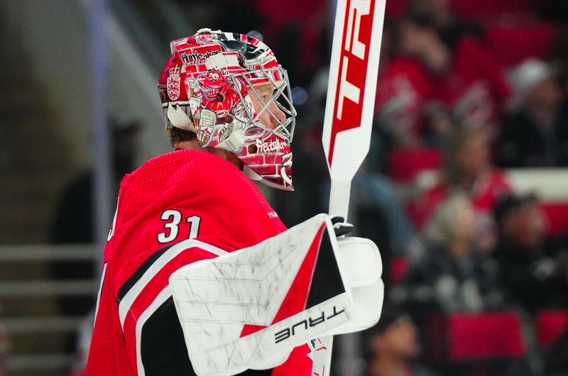 Mar 21, 2024; Raleigh, North Carolina, USA; Carolina Hurricanes goaltender Frederik Andersen (31) looks on against the Philadelphia Flyers during the second period at PNC Arena. Mandatory Credit: James Guillory-USA TODAY Sports