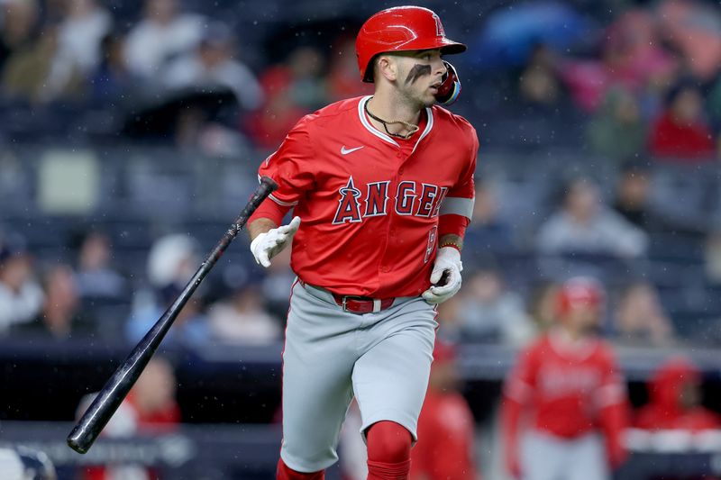 Aug 7, 2024; Bronx, New York, USA; Los Angeles Angels shortstop Zach Neto (9) flips his bat after hitting a grand slam home run against the New York Yankees during the second inning at Yankee Stadium. Mandatory Credit: Brad Penner-USA TODAY Sports