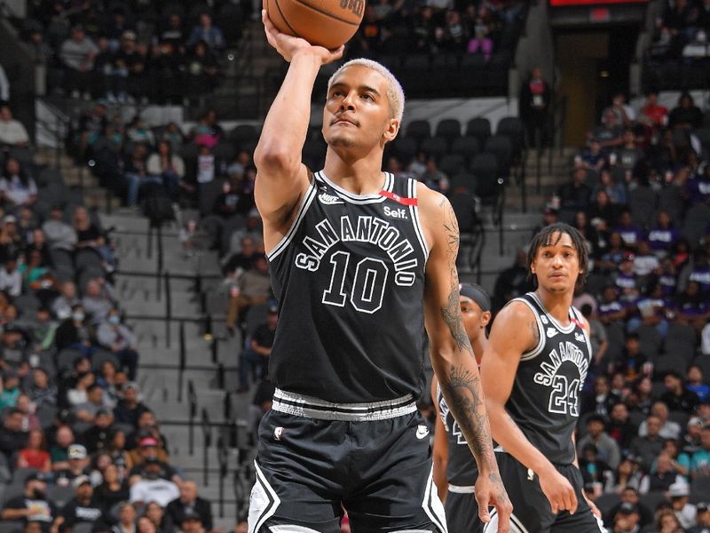 SAN ANTONIO, TX - MARCH 14: Jeremy Sochan #10 of the San Antonio Spurs shoots a free throw during the game against the Orlando Magic on March 14, 2023 at the AT&T Center in San Antonio, Texas. NOTE TO USER: User expressly acknowledges and agrees that, by downloading and or using this photograph, user is consenting to the terms and conditions of the Getty Images License Agreement. Mandatory Copyright Notice: Copyright 2023 NBAE (Photos by Michael Gonzales/NBAE via Getty Images)