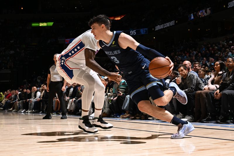 MEMPHIS, TN - NOVEMBER 20: Jake LaRavia #3 of the Memphis Grizzlies dribbles the ball during the game against the Philadelphia 76ers on November 20, 2024 at FedExForum in Memphis, Tennessee. NOTE TO USER: User expressly acknowledges and agrees that, by downloading and or using this photograph, User is consenting to the terms and conditions of the Getty Images License Agreement. Mandatory Copyright Notice: Copyright 2024 NBAE (Photo by Grant Burke/NBAE via Getty Images)