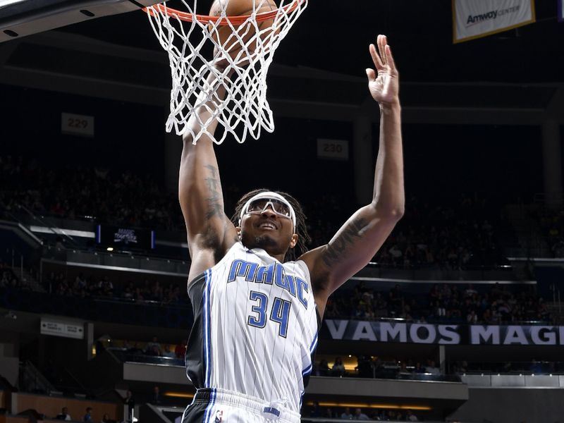 ORLANDO, FL - JANUARY 25: Wendell Carter Jr. #34 of the Orlando Magic dunks the ball against the Indiana Pacers on January 25, 2023 at Amway Center in Orlando, Florida. NOTE TO USER: User expressly acknowledges and agrees that, by downloading and or using this photograph, User is consenting to the terms and conditions of the Getty Images License Agreement. Mandatory Copyright Notice: Copyright 2023 NBAE (Photo by Fernando Medina/NBAE via Getty Images)