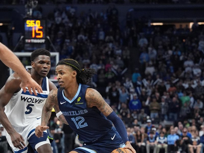 MINNEAPOLIS, MN -  JANUARY 11: Ja Morant #12 of the Memphis Grizzlies drives to the basket during the game against the Minnesota Timberwolves on January 11, 2025 at Target Center in Minneapolis, Minnesota. NOTE TO USER: User expressly acknowledges and agrees that, by downloading and or using this Photograph, user is consenting to the terms and conditions of the Getty Images License Agreement. Mandatory Copyright Notice: Copyright 2025 NBAE (Photo by Jordan Johnson/NBAE via Getty Images)