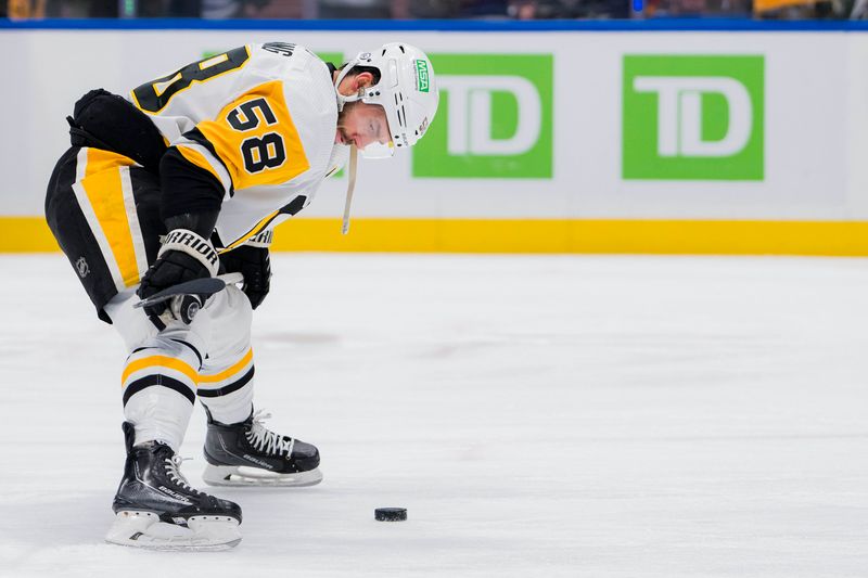 Feb 27, 2024; Vancouver, British Columbia, CAN; Pittsburgh Penguins defenseman Kris Letang (58) rests during warm up prior to a game against the Vancouver Canucks at Rogers Arena. Mandatory Credit: Bob Frid-USA TODAY Sports