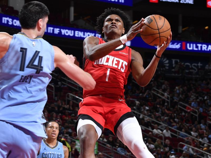 HOUSTON, TX - OCTOBER 25: Amen Thompson #1 of the Houston Rockets drives to the basket during the game against the Memphis Grizzlies on October 25, 2024 at the Toyota Center in Houston, Texas. NOTE TO USER: User expressly acknowledges and agrees that, by downloading and or using this photograph, User is consenting to the terms and conditions of the Getty Images License Agreement. Mandatory Copyright Notice: Copyright 2024 NBAE (Photo by Logan Riely/NBAE via Getty Images)