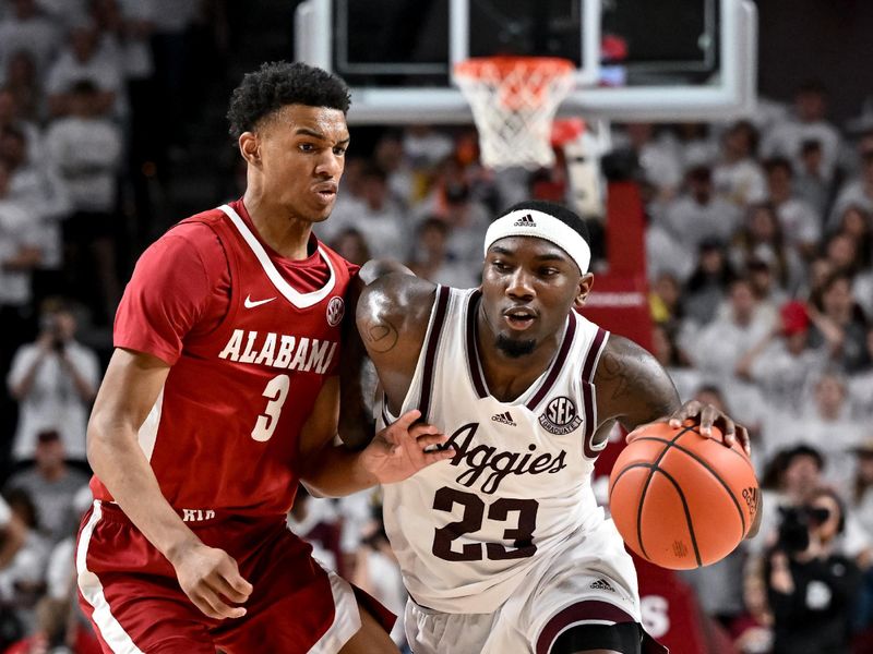 Mar 4, 2023; College Station, Texas, USA; Texas A&M Aggies guard Tyrece Radford (23) controls the ball as Alabama Crimson Tide guard Rylan Griffen (3) defends during the second half at Reed Arena. Mandatory Credit: Maria Lysaker-USA TODAY Sports