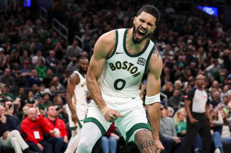 BOSTON, MA - FEBRUARY 27:  Jayson Tatum #0 of the Boston Celtics reacts after a dunk in the fourth quarter during a game against the Philadelphia 76ers at TD Garden on February 27, 2024 in Boston, Massachusetts. NOTE TO USER: User expressly acknowledges and agrees that, by downloading and or using this photograph, User is consenting to the terms and conditions of the Getty Images License Agreement. (Photo by Adam Glanzman/Getty Images)