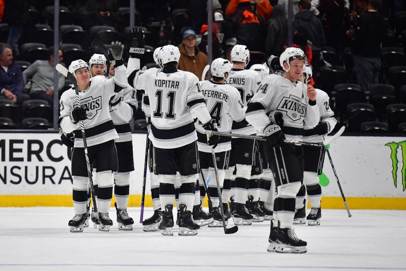 Nov 29, 2024; Anaheim, California, USA; Los Angeles Kings celebrate the victory against the Anaheim Ducks at Honda Center. Mandatory Credit: Gary A. Vasquez-Imagn Images