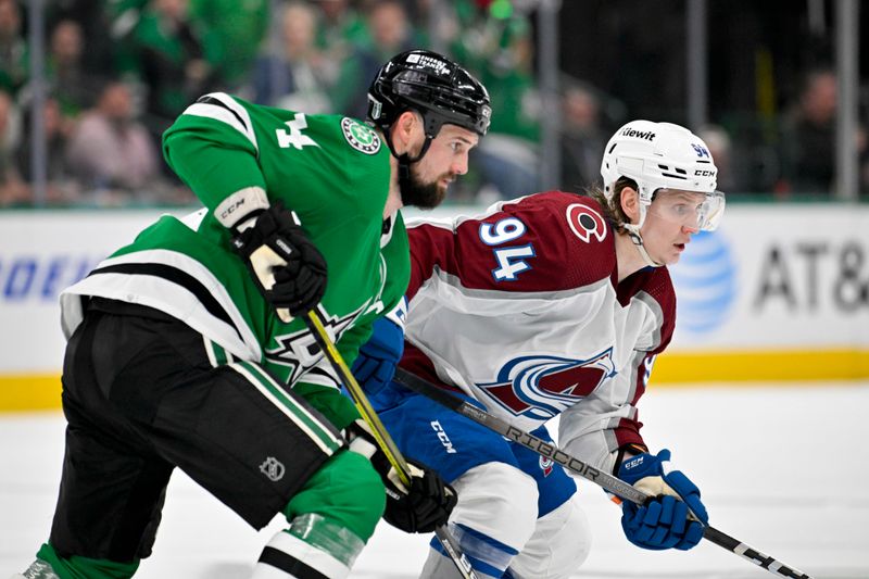 May 9, 2024; Dallas, Texas, USA; Dallas Stars left wing Jamie Benn (14) and Colorado Avalanche left wing Joel Kiviranta (94) look for the puck at center ice during the third period in game two of the second round of the 2024 Stanley Cup Playoffs at American Airlines Center. Mandatory Credit: Jerome Miron-USA TODAY Sports