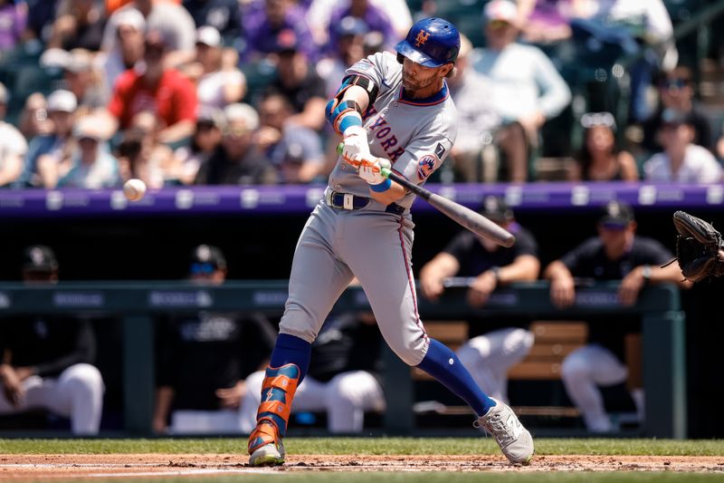 Jun 8, 2025; Denver, Colorado, USA; New York Mets second baseman Jeff McNeil (1) hits a solo home run in the second inning against the Colorado Rockies at Coors Field. Mandatory Credit: Isaiah J. Downing-Imagn Images