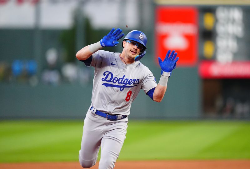 Sep 28, 2024; Denver, Colorado, USA; Los Angeles Dodgers third baseman Enrique Hernandez (8) celebrates his three-run home run in the second inning against the Colorado Rockies at Coors Field. Mandatory Credit: Ron Chenoy-Imagn Images