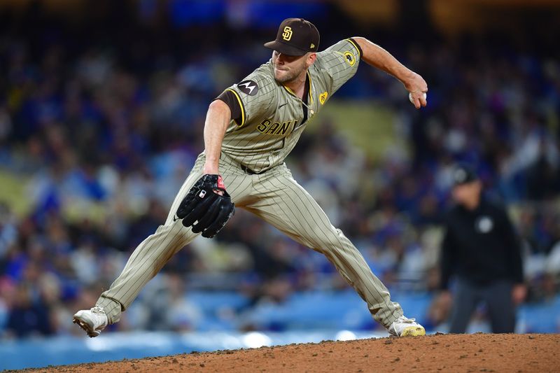 Apr 13, 2024; Los Angeles, California, USA; San Diego Padres pitcher Tom Cosgrove (59) throws against the Los Angeles Dodgers during the sixth inning at Dodger Stadium. Mandatory Credit: Gary A. Vasquez-USA TODAY Sports