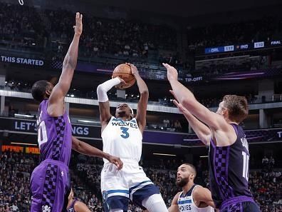 SACRAMENTO, CA - DECEMBER 23: Jaden McDaniels #3 of the Minnesota Timberwolves drives to the basket during the game against the Sacramento Kings on December 23, 2023 at Golden 1 Center in Sacramento, California. NOTE TO USER: User expressly acknowledges and agrees that, by downloading and or using this Photograph, user is consenting to the terms and conditions of the Getty Images License Agreement. Mandatory Copyright Notice: Copyright 2023 NBAE (Photo by Rocky Widner/NBAE via Getty Images)