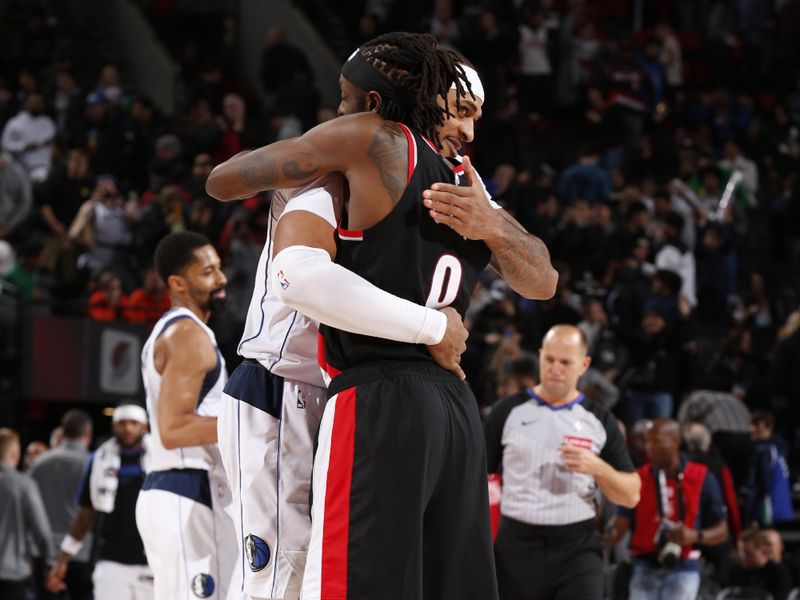 PORTLAND, OR - DECEMBER 1: Daniel Gafford #21 of the Dallas Mavericks and Jerami Grant #9 of the Portland Trail Blazers embrace after the game on December 1, 2024 at the Moda Center Arena in Portland, Oregon. NOTE TO USER: User expressly acknowledges and agrees that, by downloading and or using this photograph, user is consenting to the terms and conditions of the Getty Images License Agreement. Mandatory Copyright Notice: Copyright 2024 NBAE (Photo by Cameron Browne/NBAE via Getty Images)