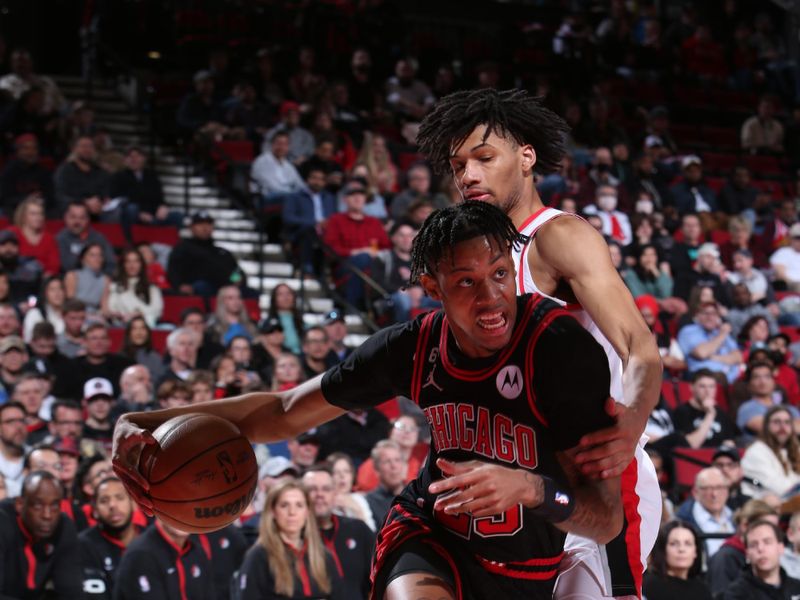 PORTLAND, OR - MARCH 24: Dalen Terry #25 of the Chicago Bulls moves the ball during the game against the Portland Trail Blazers on March 24, 2023 at the Moda Center Arena in Portland, Oregon. NOTE TO USER: User expressly acknowledges and agrees that, by downloading and or using this photograph, user is consenting to the terms and conditions of the Getty Images License Agreement. Mandatory Copyright Notice: Copyright 2023 NBAE (Photo by Sam Forencich/NBAE via Getty Images)