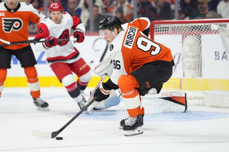 Dec 13, 2025; Philadelphia, Pennsylvania, USA; Philadelphia Flyers defenseman Ty Murchison (96) controls the puck against the Carolina Hurricanes in the first period at Xfinity Mobile Arena. Mandatory Credit: Kyle Ross-Imagn Images