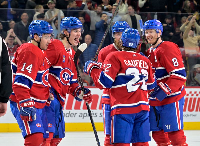 Apr 9, 2024; Montreal, Quebec, CAN; Montreal Canadiens forward Juraj Slafkovsky (20) celebrates with teammates including defenseman Mike Matheson (8) and Montreal Canadiens forward Nick Suzuki (14) and  forward Cole Caufield (22) after scoring a goal against the Philadelphia Flyers during the second period at the Bell Centre. Mandatory Credit: Eric Bolte-USA TODAY Sports