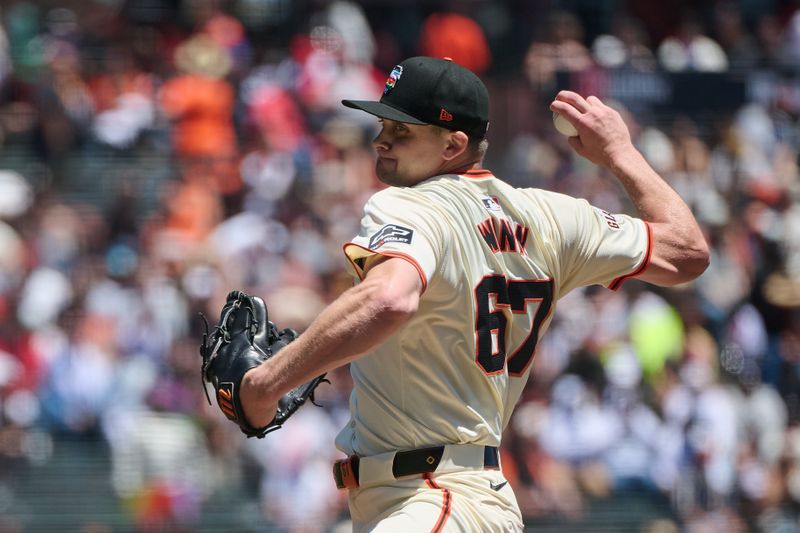 Jun 15, 2024; San Francisco, California, USA; San Francisco Giants starting pitcher Keaton Winn (67) throws a pitch against the Los Angeles Angels during the first inning at Oracle Park. Mandatory Credit: Robert Edwards-USA TODAY Sports