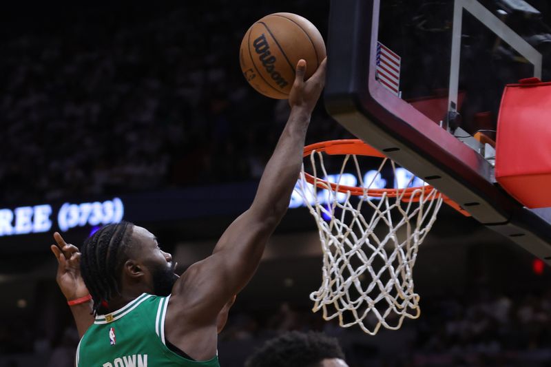 MIAMI, FLORIDA - MAY 23: Jaylen Brown #7 of the Boston Celtics drives to the net against the Miami Heat during the second quarter in game four of the Eastern Conference Finals at Kaseya Center on May 23, 2023 in Miami, Florida. NOTE TO USER: User expressly acknowledges and agrees that, by downloading and or using this photograph, User is consenting to the terms and conditions of the Getty Images License Agreement. (Photo by Megan Briggs/Getty Images)