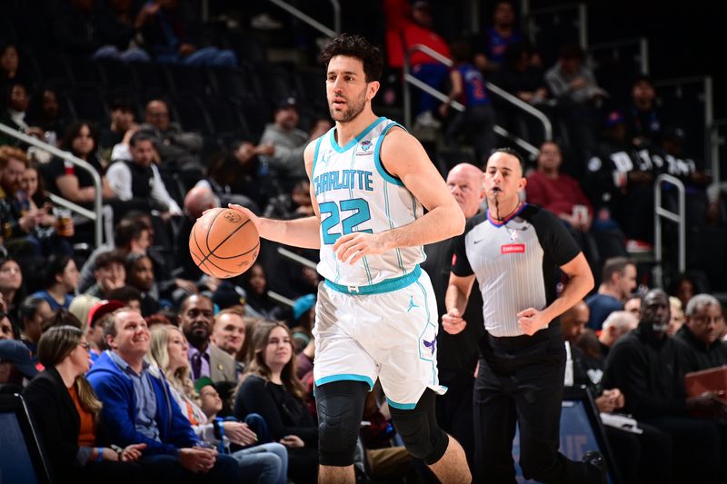 DETROIT, MI - MARCH 11:  Vasilije Micic #22 of the Charlotte Hornets  dribbles the ball during the game against the Detroit Pistons on March 11, 2024 at Little Caesars Arena in Detroit, Michigan. NOTE TO USER: User expressly acknowledges and agrees that, by downloading and/or using this photograph, User is consenting to the terms and conditions of the Getty Images License Agreement. Mandatory Copyright Notice: Copyright 2024 NBAE (Photo by Chris Schwegler/NBAE via Getty Images)