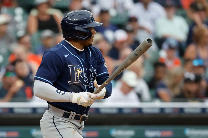 Aug 6, 2023; Detroit, Michigan, USA; Tampa Bay Rays shortstop Wander Franco (5) hits a single in the sixth inning against the Detroit Tigers at Comerica Park. Mandatory Credit: Rick Osentoski-USA TODAY Sports