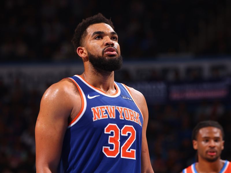 OKLAHOMA CITY, OK - JANUARY 3:  Karl-Anthony Towns #32 of the New York Knicks shoots a free throw during the game against the Oklahoma City Thunder on January 3, 2025 at Paycom Center in Oklahoma City, Oklahoma. NOTE TO USER: User expressly acknowledges and agrees that, by downloading and or using this photograph, User is consenting to the terms and conditions of the Getty Images License Agreement. Mandatory Copyright Notice: Copyright 2025 NBAE (Photo by Zach Beeker/NBAE via Getty Images)