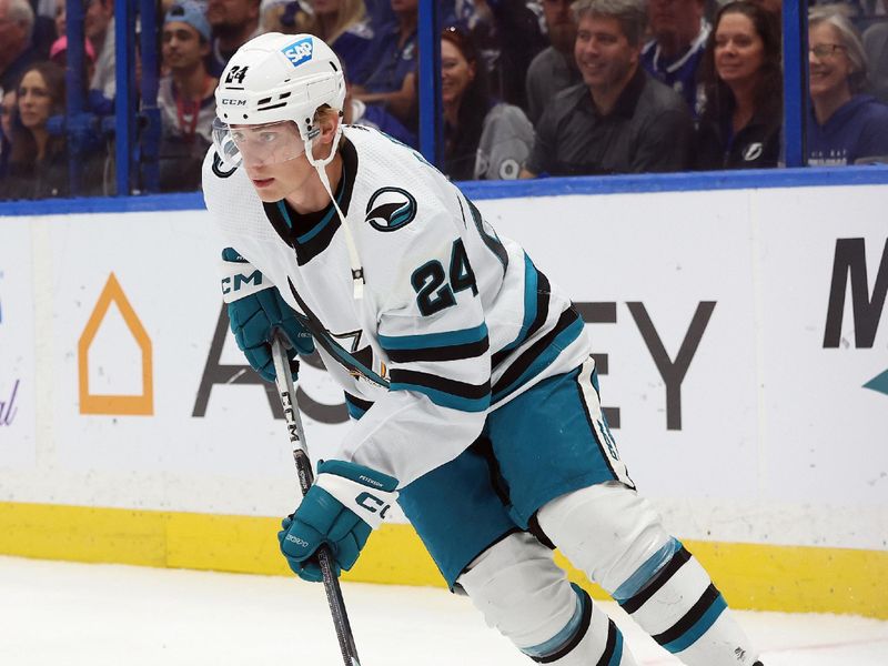 Oct 26, 2023; Tampa, Florida, USA; San Jose Sharks center Jacob Peterson (24) skates with the puck against the Tampa Bay Lightning during the first period at Amalie Arena. Mandatory Credit: Kim Klement Neitzel-USA TODAY Sports