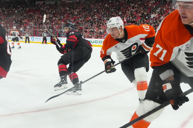 Oct 11, 2025; Raleigh, North Carolina, USA;  Philadelphia Flyers right wing Bobby Brink (10) watches the play against the Carolina Hurricanes during the second period at Lenovo Center. Mandatory Credit: James Guillory-Imagn Images